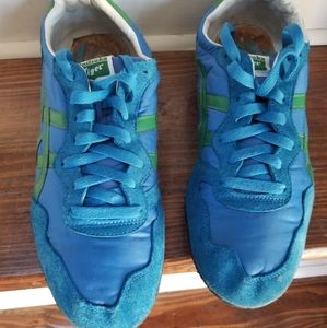 These are a pair of used onitsuka tiger shoes.